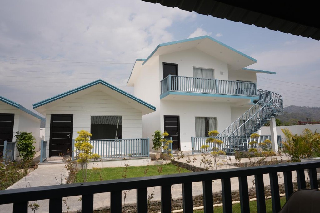 Spacious restaurant interior with marble floor and place settings