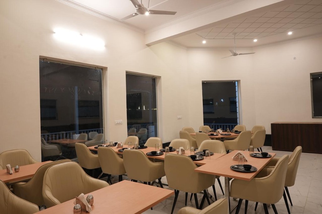 Resort architecture with white walls and teal blue accents